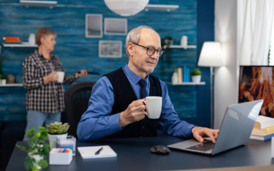 Happy senior man after reading a email