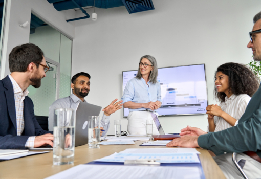 Diverse executive team people discussing company