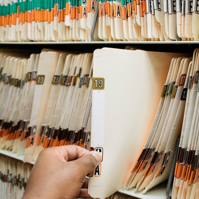 African american man pulling medical records char 2023 11 27 04 53 03 utc