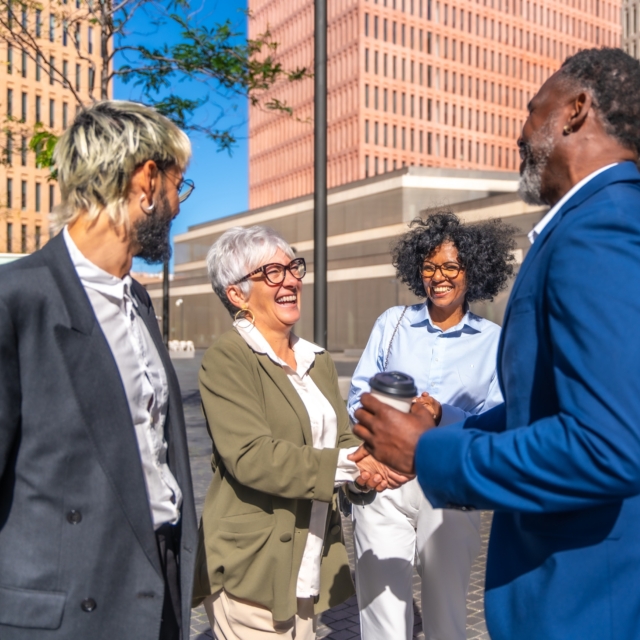 Business people greeting in an outdoors meeting 2023 11 27 05 15 22 utc